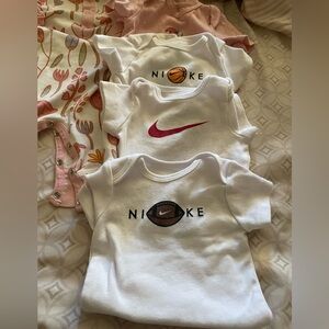Nike baby girl onesies